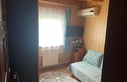 Casă de lemn cu teren generos – 1500 mp în Cerghid, liniște și natură