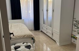 Apartament cu 3 camere în suprafață de 110 și un teren de 400 mp