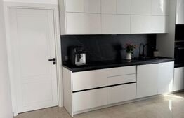 Apartament cu 3 camere în suprafață de 110 și un teren de 400 mp