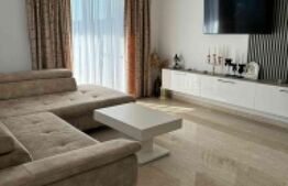 Apartament cu 3 camere în suprafață de 110 și un teren de 400 mp